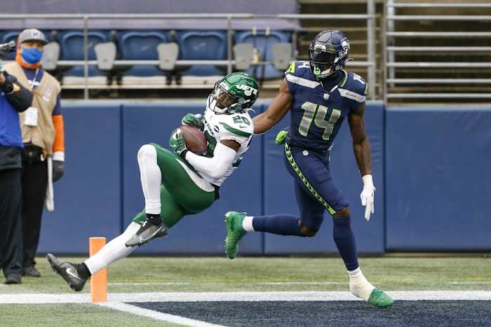 Jets free safety Marcus Maye (20) intercepts a pass intended for Seahawks receiver DK Metcalf (14). Mandatory Credit: Joe Nicholson-USA TODAY Sports